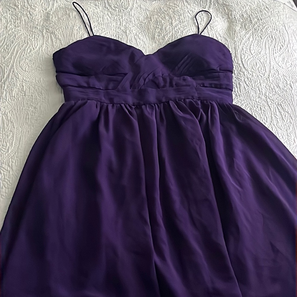 Woman purple dress